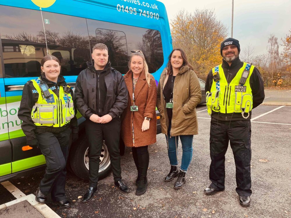 Melin staff and police officers stood together