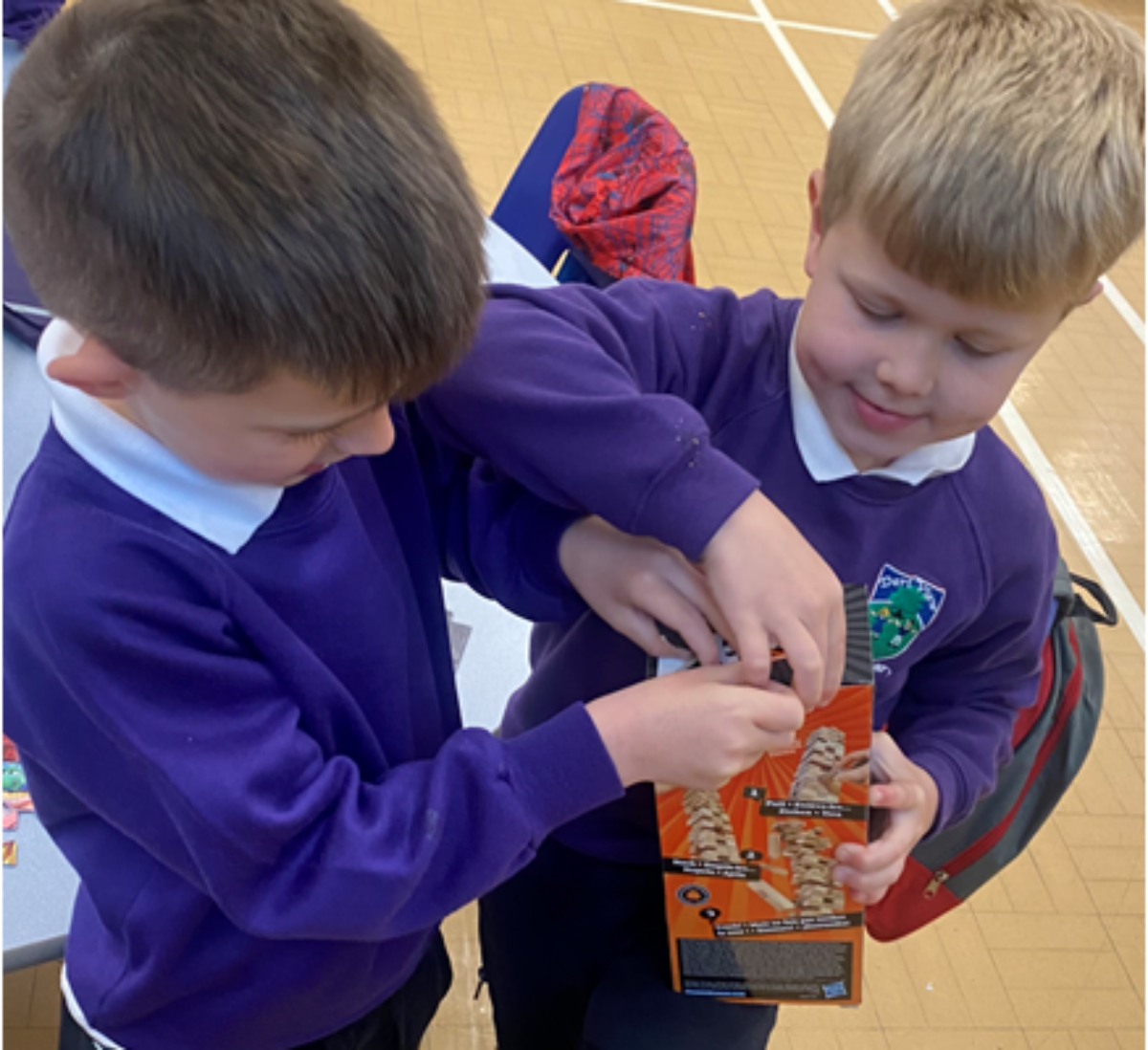 School children playing with a toy