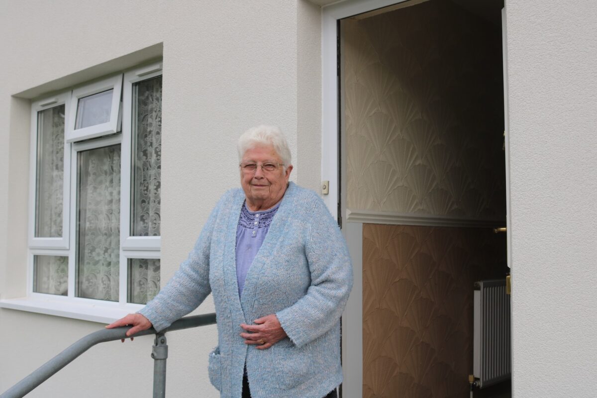 Mrs Morgan stood in front of her doorway