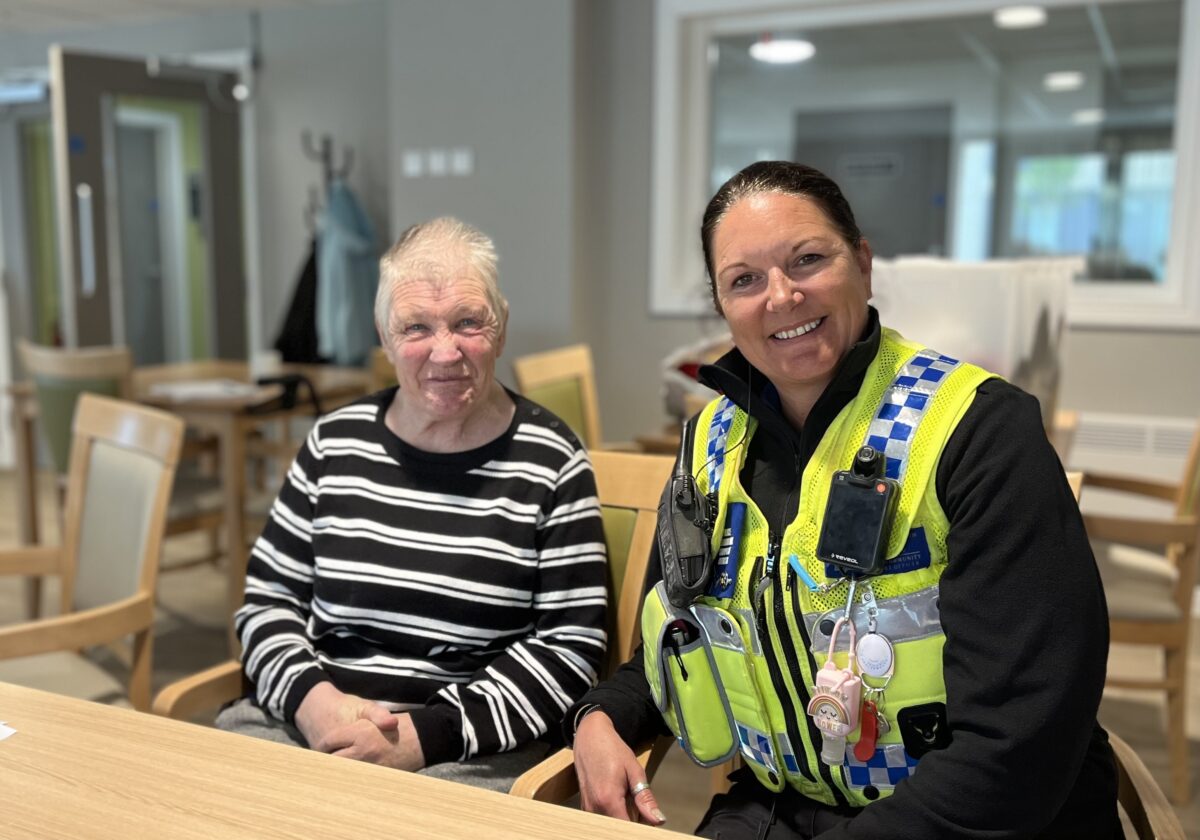 Community Police Officer with resident